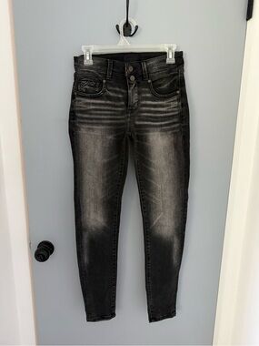 Buckle High-Rise Washed Black Skinny Jeans